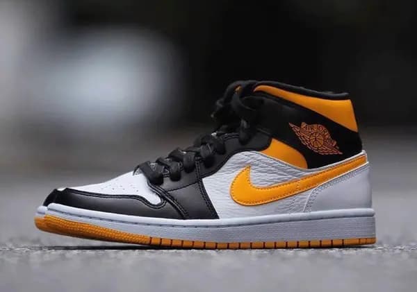 Air Jordan 1 Mid xuất hiện với vẻ ngoài màu cam vàng Air Jordan 1 Mid xuất hiện với vẻ ngoài màu cam vàng