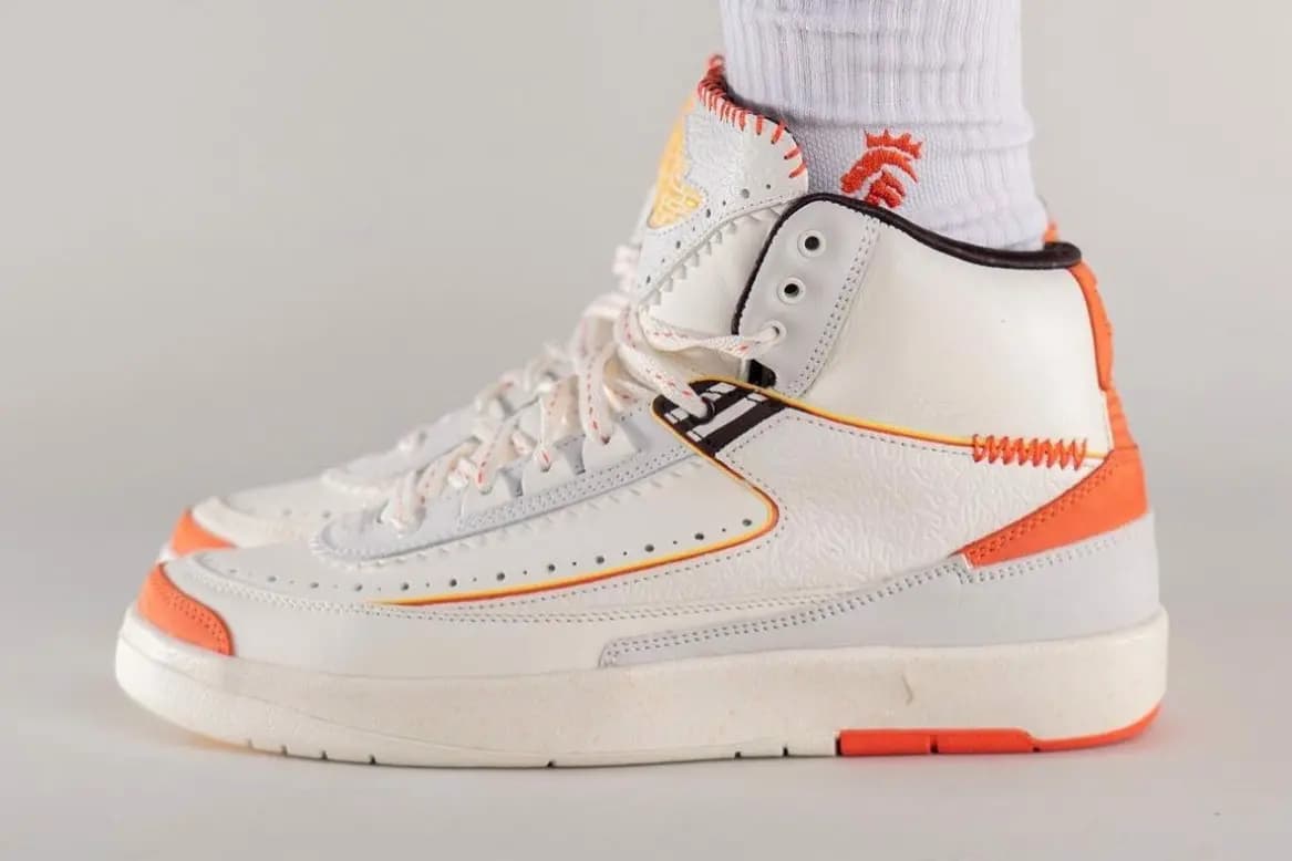Hình ảnh on-feet của phiên bản Maison Château Rouge x Air Jordan 2 Hình ảnh on-feet của phiên bản Maison Château Rouge x Air Jordan 2