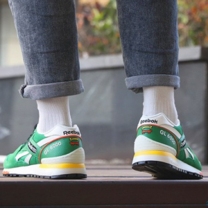 Giay Reebok Keith Haring x GL 6000 'Dog and Human Heel Print' GZ1460