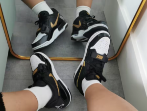 Giay Nike Air Jordan Legacy 312 Low GS 'Black Gold' CD9054-071