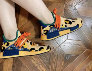 Giay Adidas NMD Human Race x Pharrell 'Animal Pulse Amber' HP3221