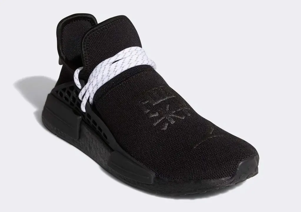 Pharrell x adidas Hu NMD xuat hien trong mau den quyen ru