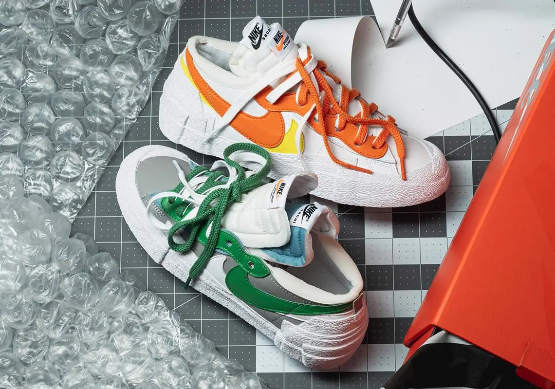 Hinh anh chinh thuc cua doi KAWS x sacai Nike Blazer Low “Team Red”