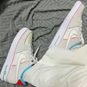 Giay Nike Air Force 1 LV8 GS 'Holiday Cookies' FQ8350-110