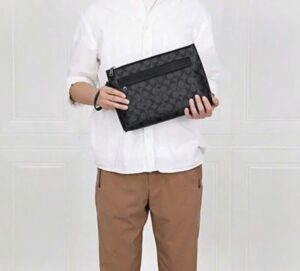 Tui Coach Carryall Pouch In Signature Canvas 'Charcoal' F29508-CQBK