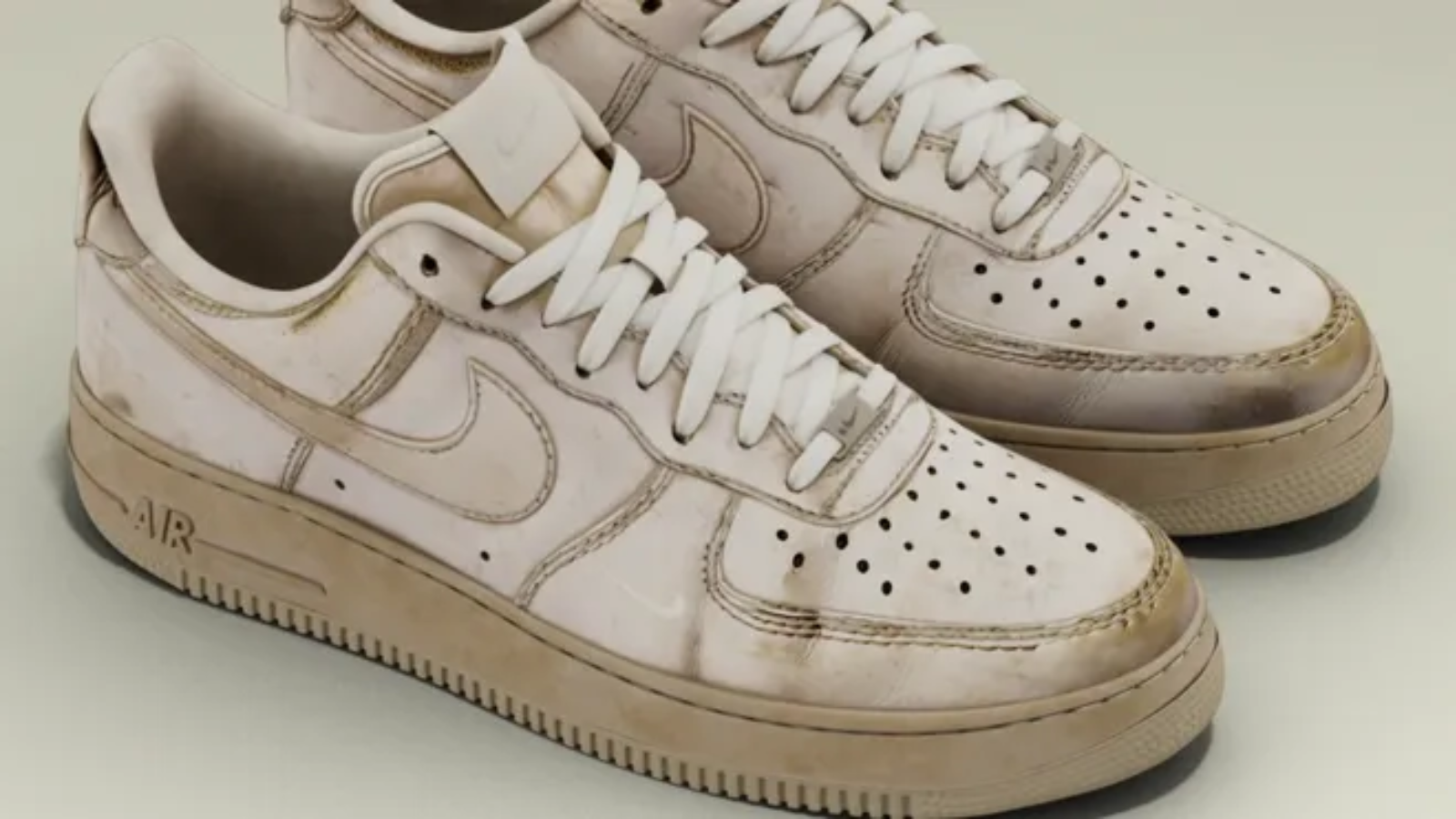 Hinh anh 10: Hinh anh cua mot doi sneaker distressed doc dao voi phong cach tray xuoc, bac mau