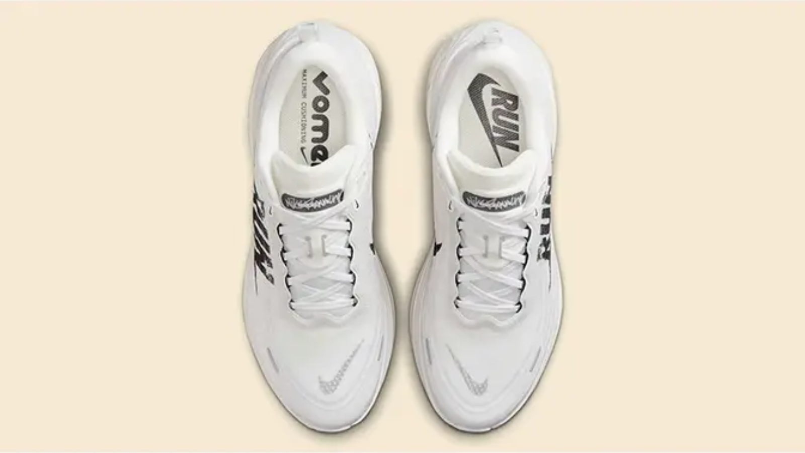 Hinh anh 6: Hinh anh Nike Vomero Plus Reverse Swoosh voi thiet ke Swoosh nguoc doc dao