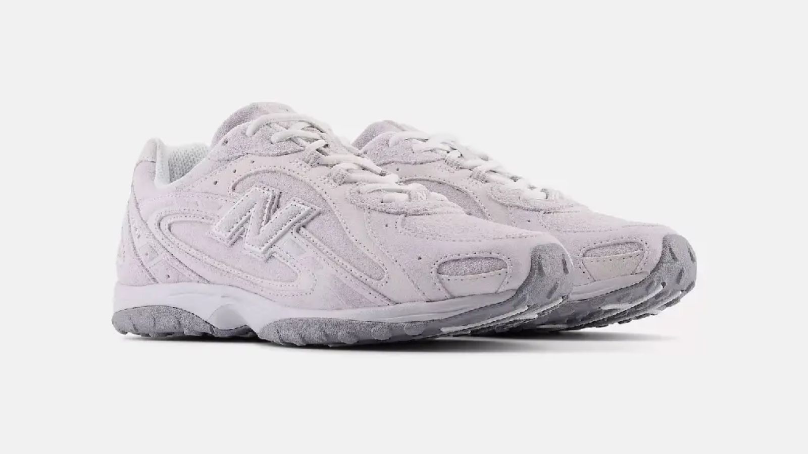 Hinh anh 1: Giay New Balance 204L mau 'Pink' va 'Lavender' tren nen pastel