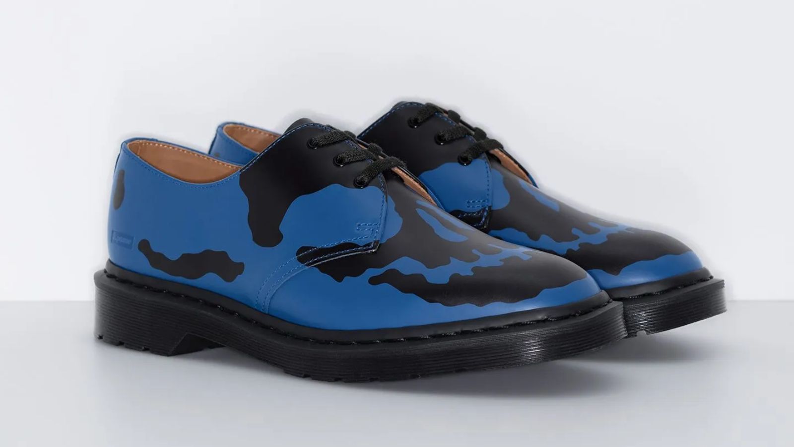 Hinh anh 3: Phien ban Supreme x Dr. Martens 1461 3-Eye voi thiet ke dau lau