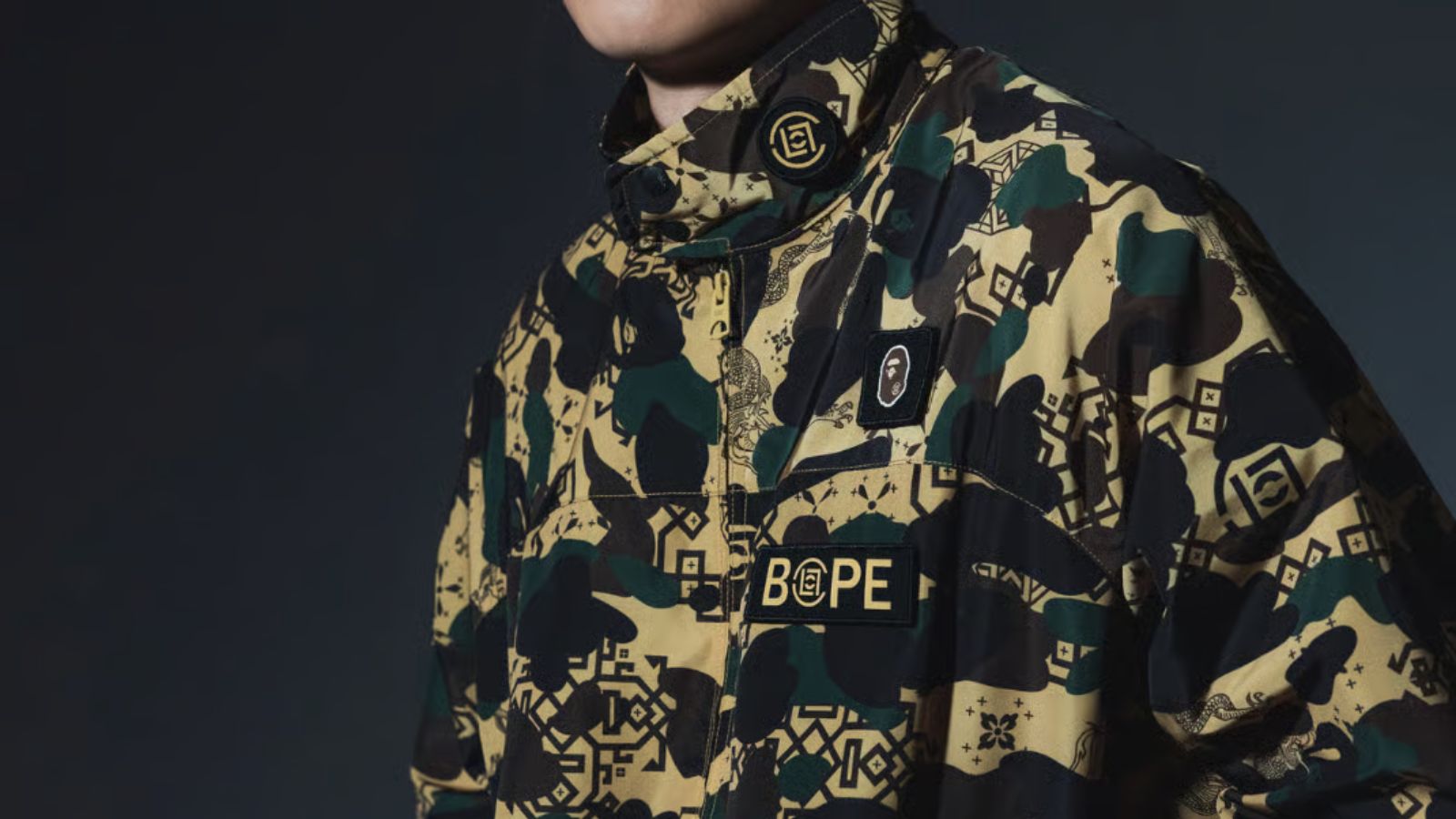 Hinh anh 1: Hinh anh bo suu tap capsule 2026 cua BAPE va CLOT voi hoa tiet 1ST CAMO va Silk Royale