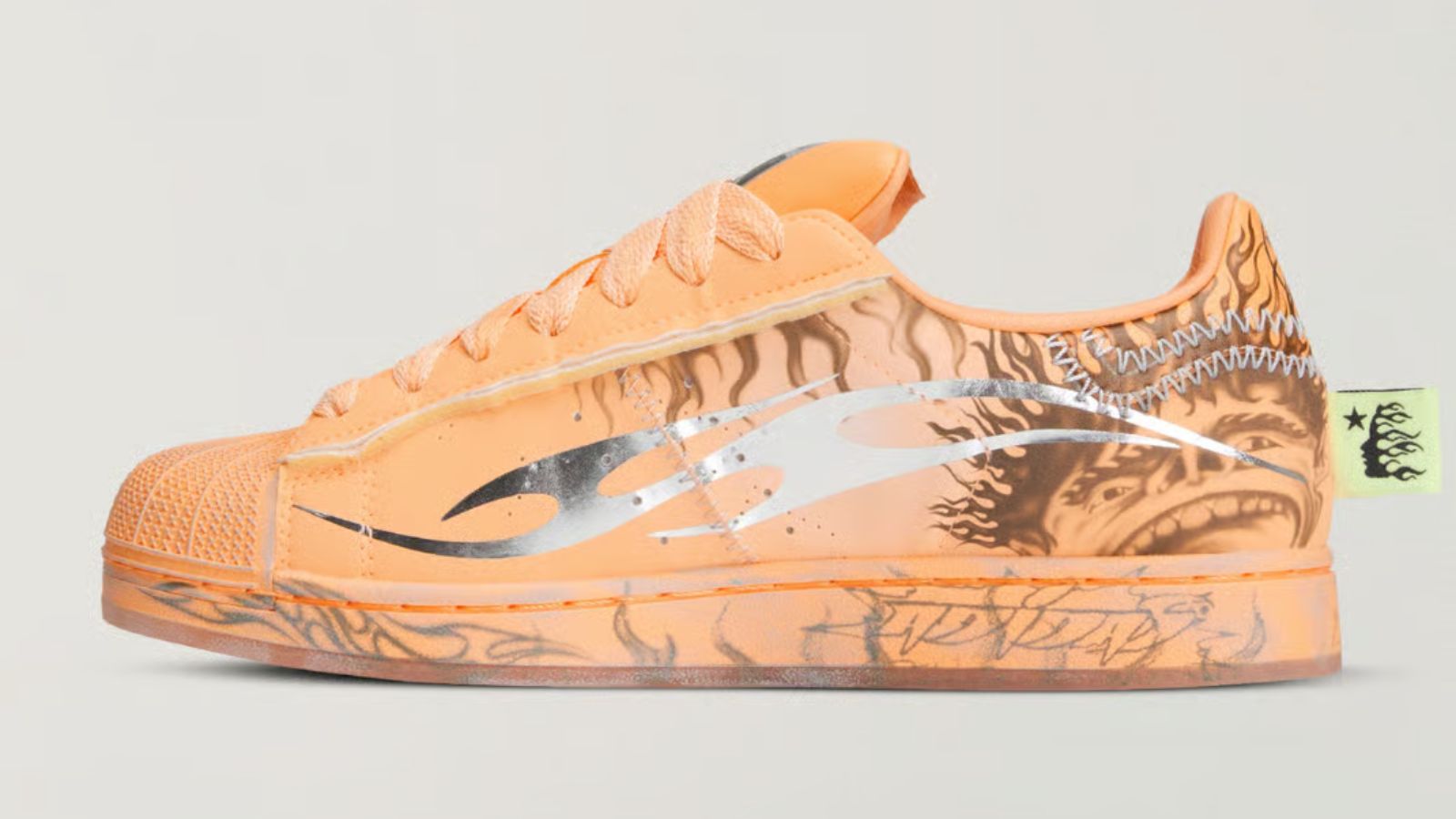 Hinh anh 2: Hellstar x adidas Superstar Hazy Orange voi thiet ke cam noi bat