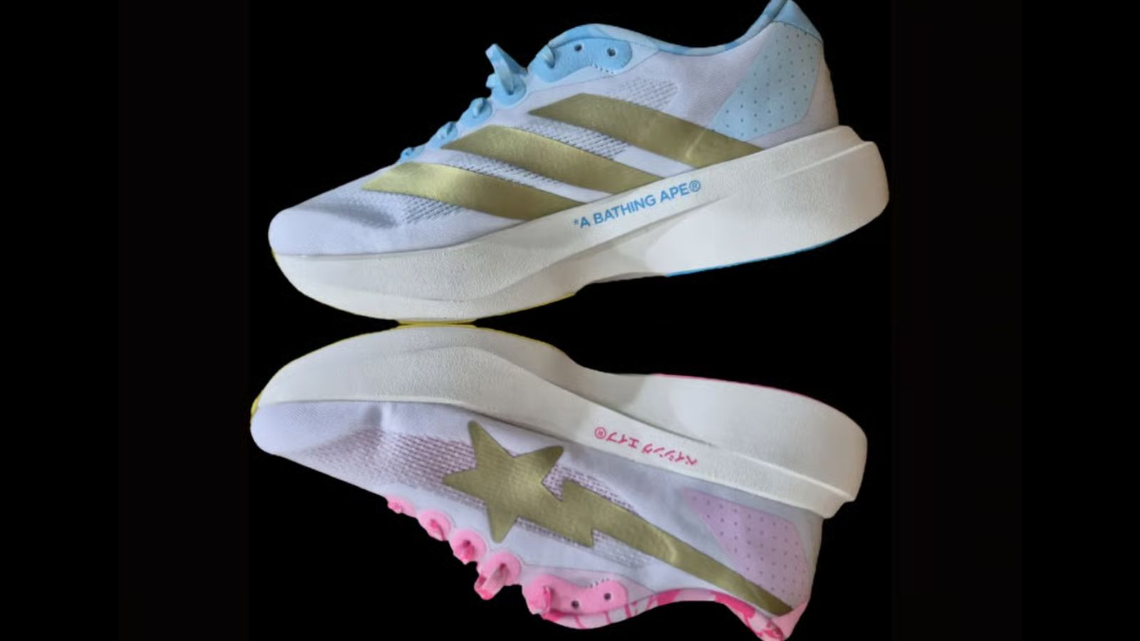 Hinh anh 1: Giay BAPE x adidas Adizero Evo SL voi hoa tiet ABC Camo va thiet ke bat doi xung