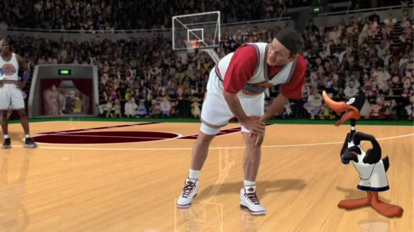 Hinh anh 1: Michael Jordan mang Air Jordan 11 Space Jam trong phim Space Jam